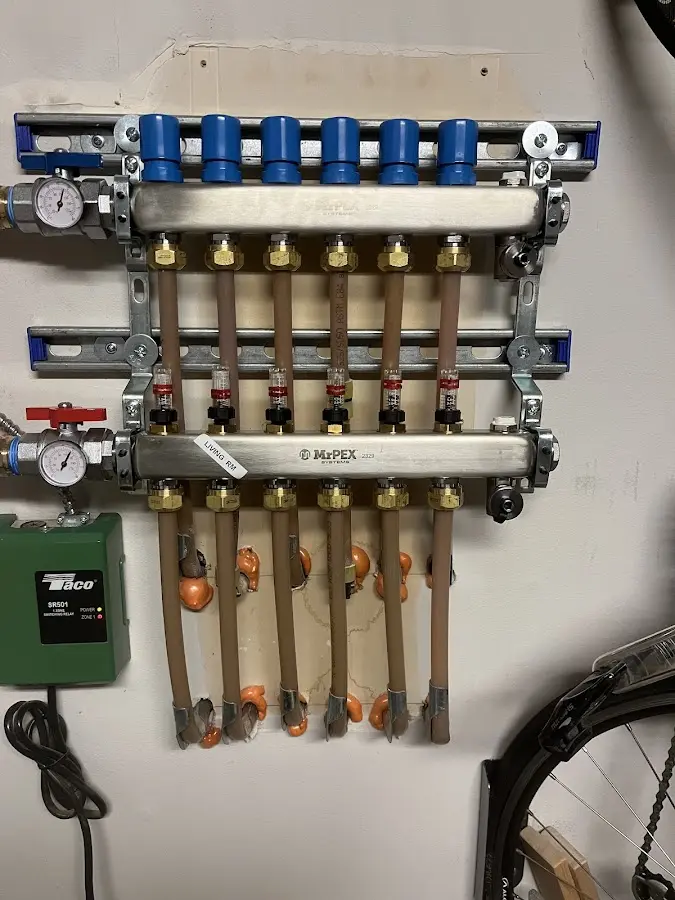 Plumber performing Water Heater Repair at a residential property in Linwood